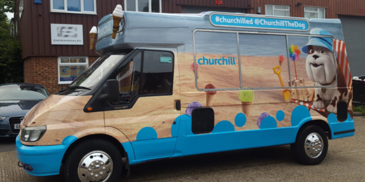An ice cream van with Churchill graphics on it.